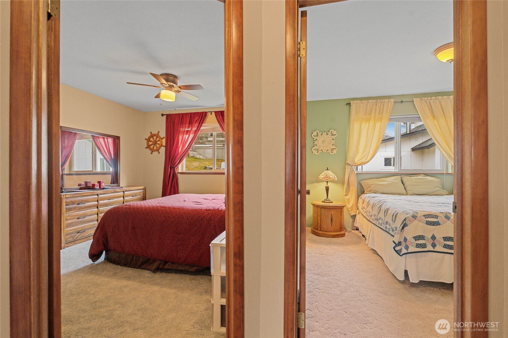 2548 Entiat Way Entiat, WA 98822 - Photo 18 of 40 a bedroom with a bed and a painting on the wall