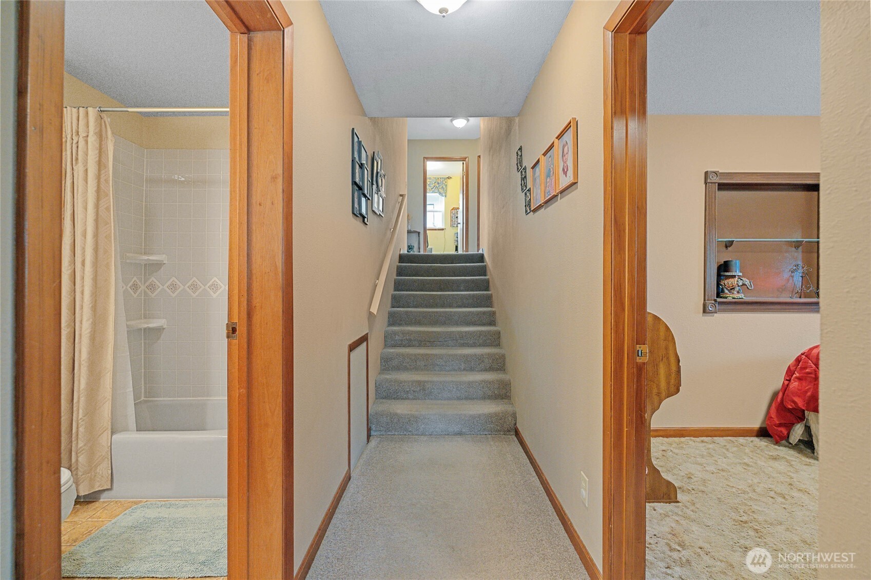 2548 Entiat Way Entiat, WA 98822 - Photo 20 of 40 a view of hallway with stairs and wooden floor