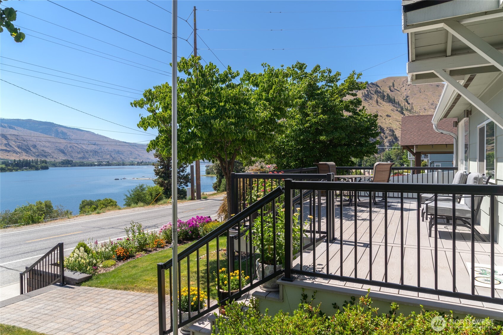2548 Entiat Way Entiat, WA 98822 - Photo 2 of 40 a view of a balcony with wooden fence
