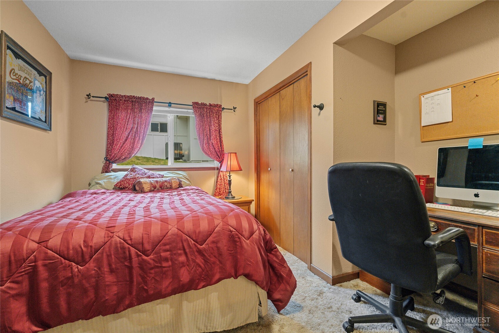 2548 Entiat Way Entiat, WA 98822 - Photo 21 of 40 a bedroom with a bed and a chair