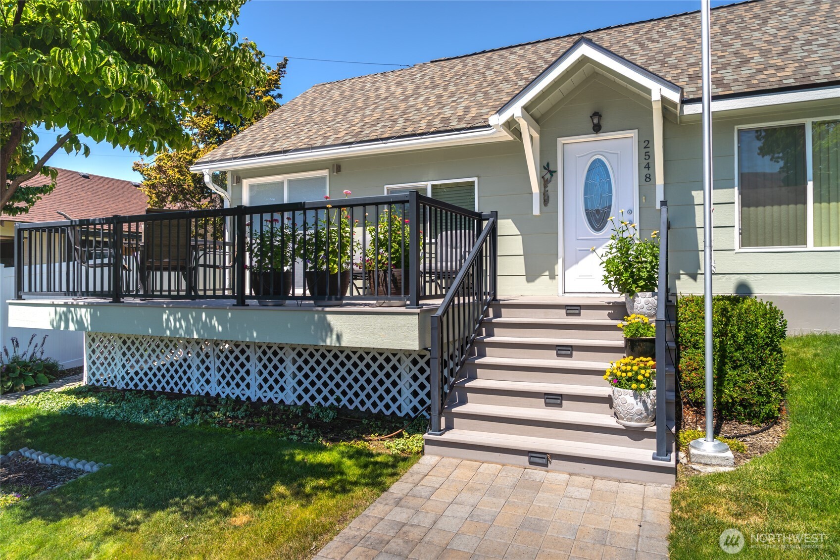 2548 Entiat Way Entiat, WA 98822 - Photo 3 of 40 a front view of a house with a garden