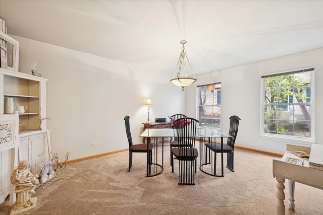 a view of a dining room with furniture