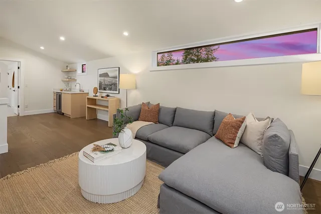 a living room with furniture and a couch