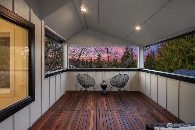 a view of balcony with furniture