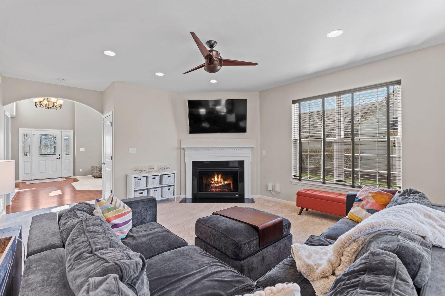 1866 River Lakes Road South Oconomowoc, WI 53066 - Photo 6 of 41 Family Room with Gas Fireplace