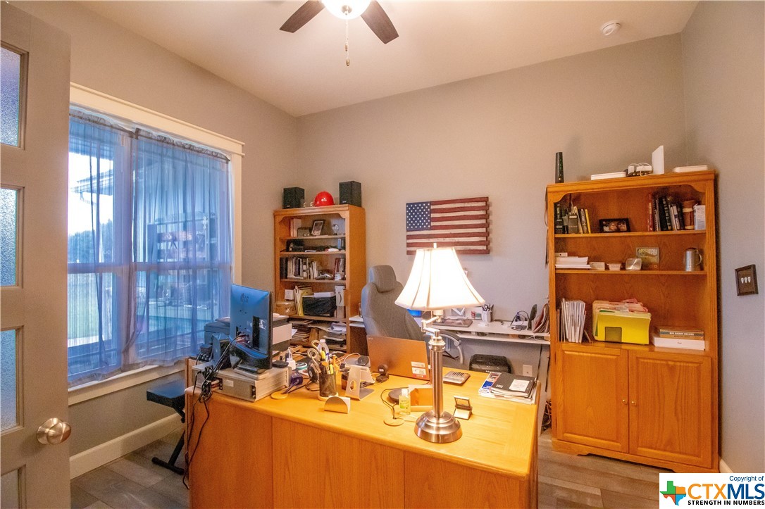 a room with furniture and window