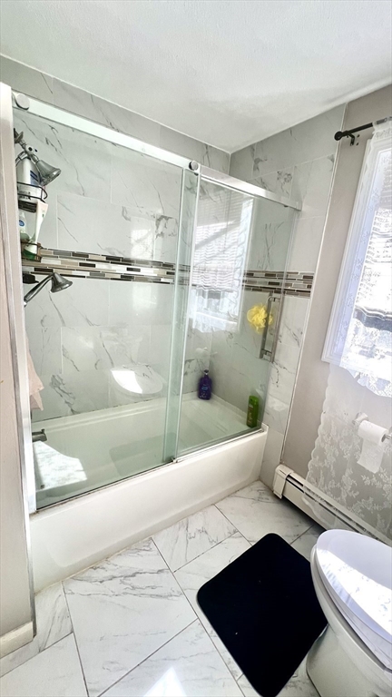 5 Flintlocke Road Franklin, MA 02038 - Photo 14 of 34 a bathroom with a bathtub and a shower