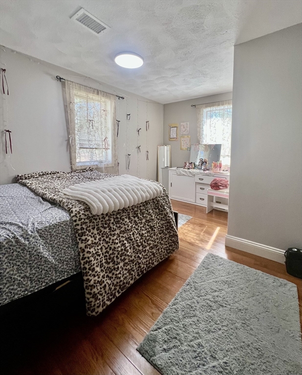 5 Flintlocke Road Franklin, MA 02038 - Photo 17 of 34 a bed room with a bed and a window