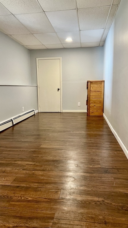 5 Flintlocke Road Franklin, MA 02038 - Photo 25 of 34 a view of an empty room with wooden floor