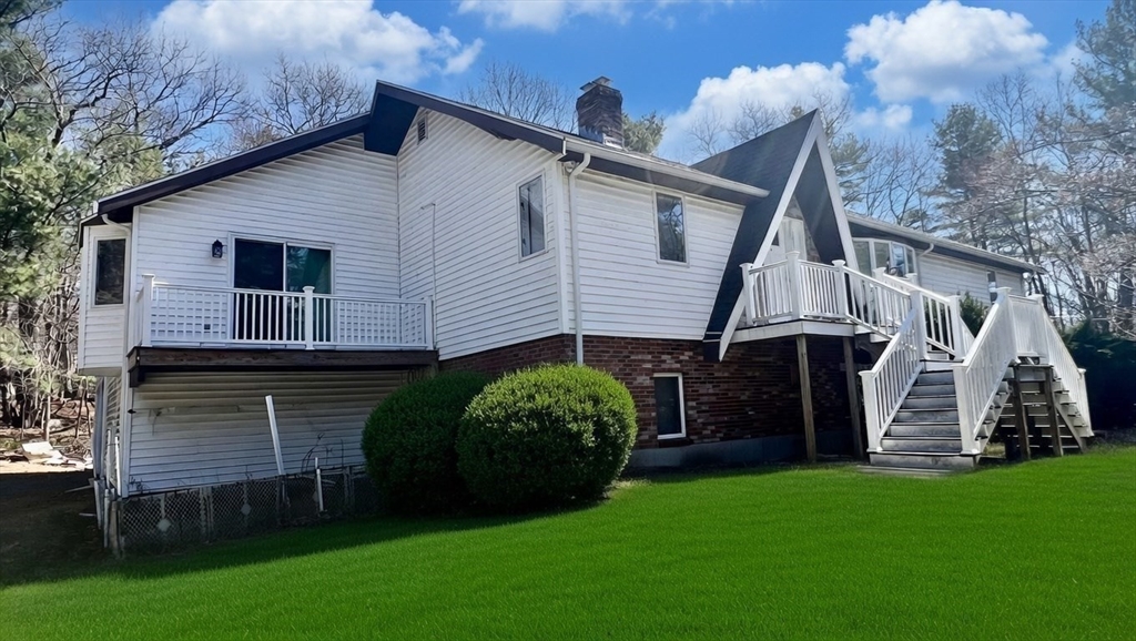5 Flintlocke Road Franklin, MA 02038 - Photo 32 of 34 a view of a house with a garden