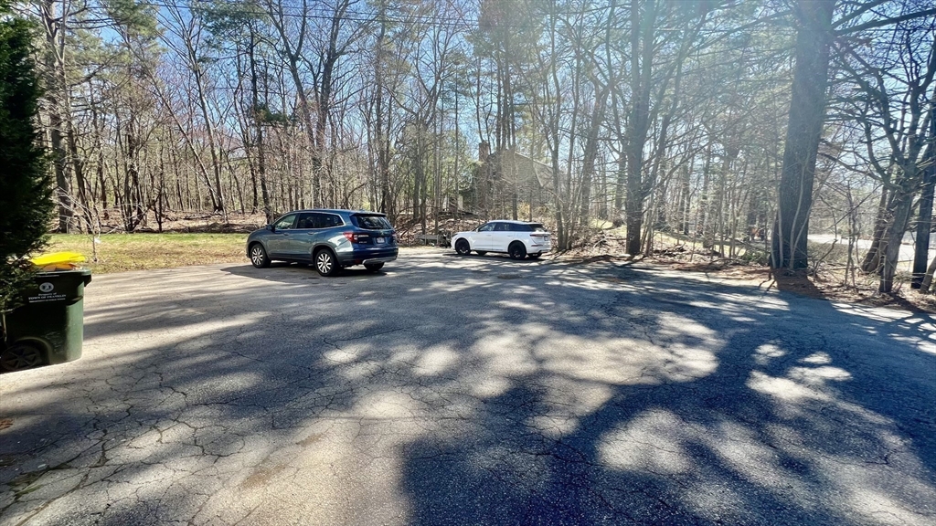 5 Flintlocke Road Franklin, MA 02038 - Photo 33 of 34 a view of a parking space with parked cars