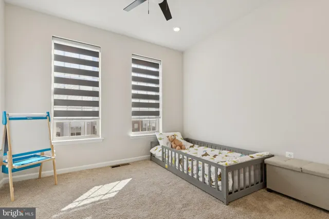a bathroom with a sink a shower a mirror and a bathtub