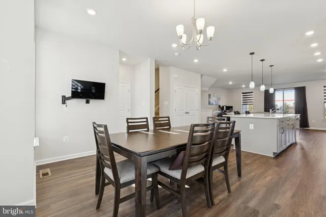 a kitchen with a stove and a microwave