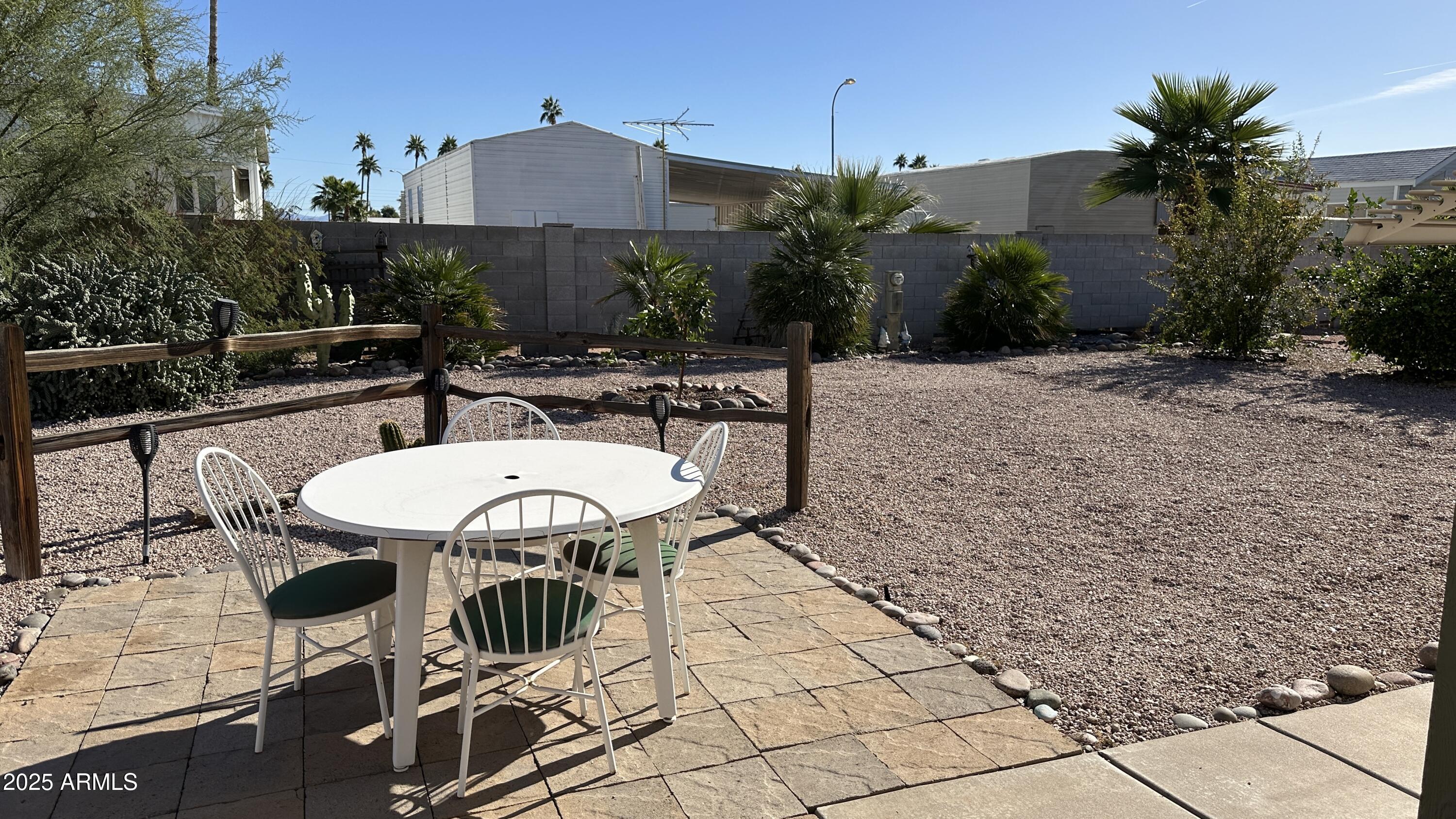 834 South Meridian Road, Unit 105 Apache Junction, AZ 85120 - Photo 38 of 48 a view of outdoor dining space with a patio