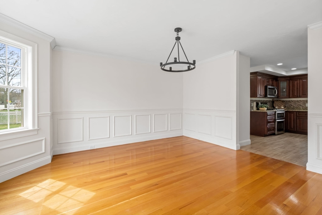 30 Neponset Street Walpole, MA 02071 - Photo 17 of 41 a view of a livingroom with a furniture wooden floor and a window