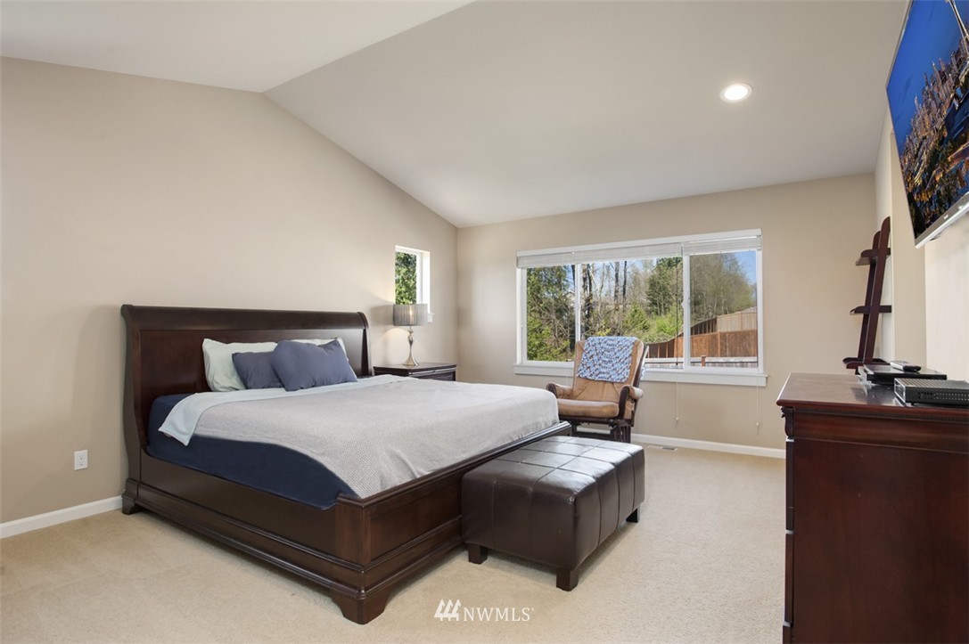 6100 Southeast 2nd Street Renton, WA 98059 - Photo 14 of 24 a bedroom with a bed and window