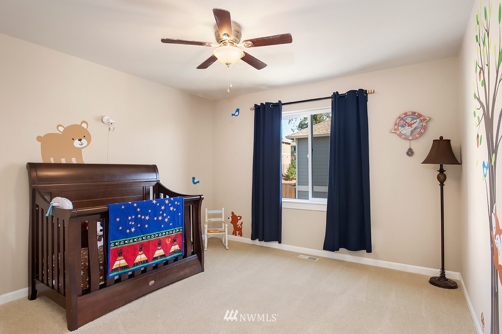 6100 Southeast 2nd Street Renton, WA 98059 - Photo 17 of 24 a living room with furniture and a fireplace