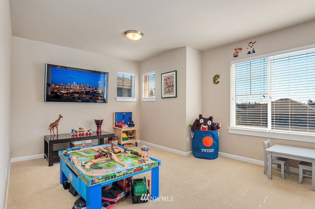 6100 Southeast 2nd Street Renton, WA 98059 - Photo 19 of 24 a living room with furniture and a pool table