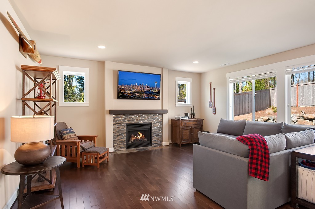 6100 Southeast 2nd Street Renton, WA 98059 - Photo 6 of 24 a living room with furniture and a fireplace
