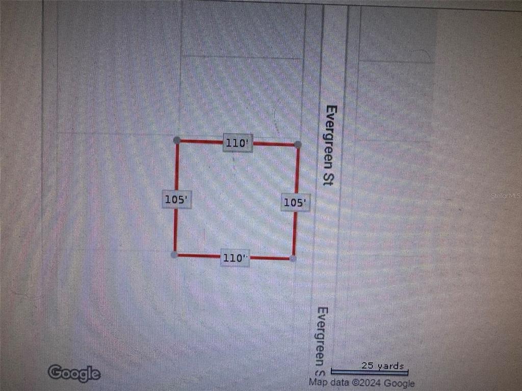 Evergreen Street New Port Richey, FL 34654 - Photo 4 of 6 a bathroom with a shower