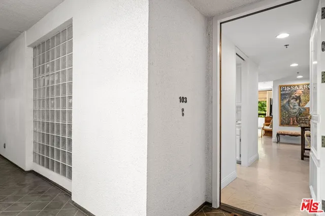 a view of livingroom with furniture and floor to ceiling window