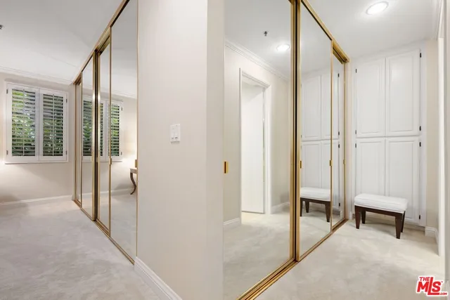a bath tub sitting in a bathroom next to a sink