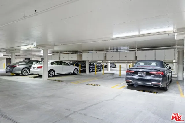 a front view of a house with yard and fountain