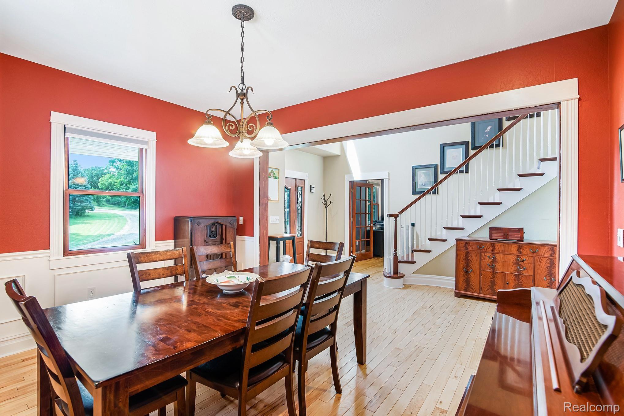 5412 Vines Road Howell, MI 48843 - Photo 10 of 47 Formal dining room with wainscoting.