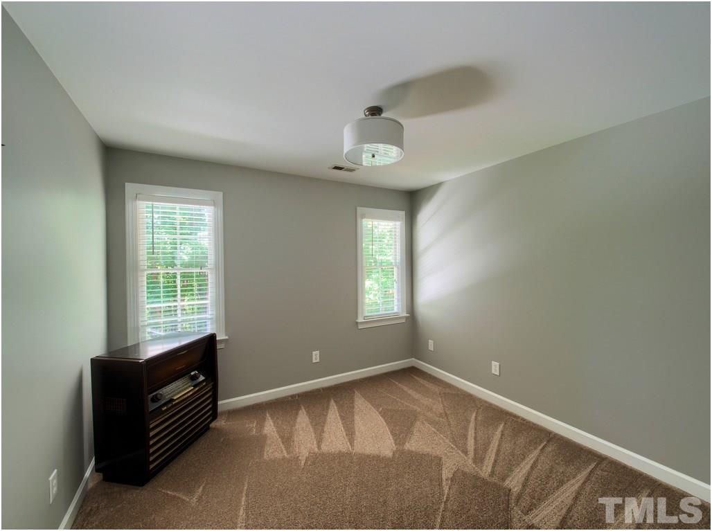 7908 Ogden Court Raleigh, NC 27613 - Photo 17 of 25 an empty room with a window