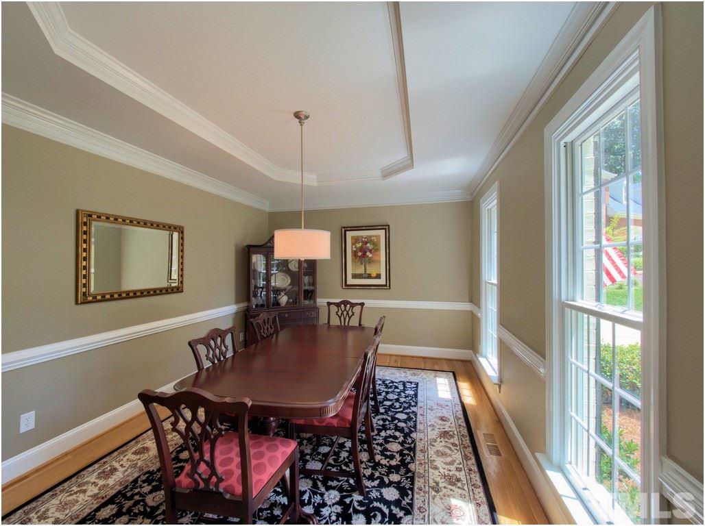 7908 Ogden Court Raleigh, NC 27613 - Photo 3 of 25 a dining room with furniture and window