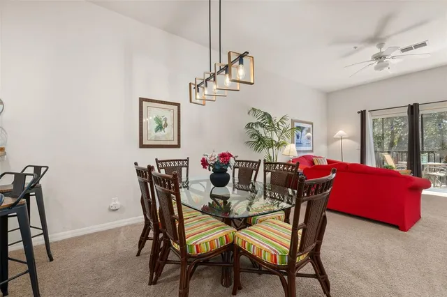 a spacious bedroom with a bed and a window