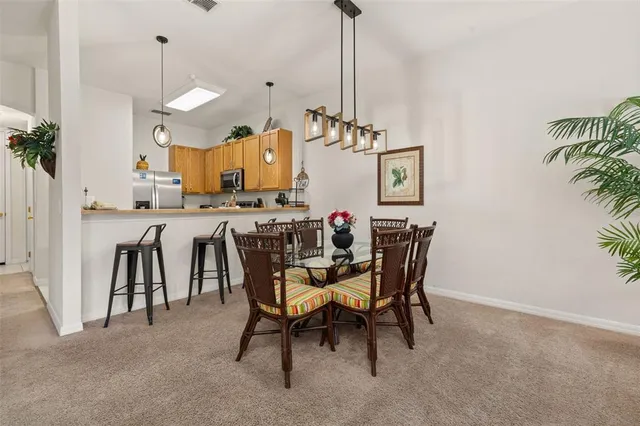 a bed room with a bed mirror and a window