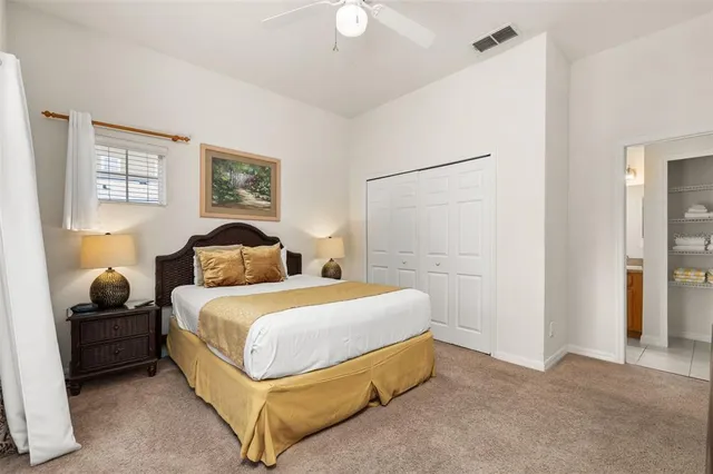a view of a balcony with furniture and wooden floor