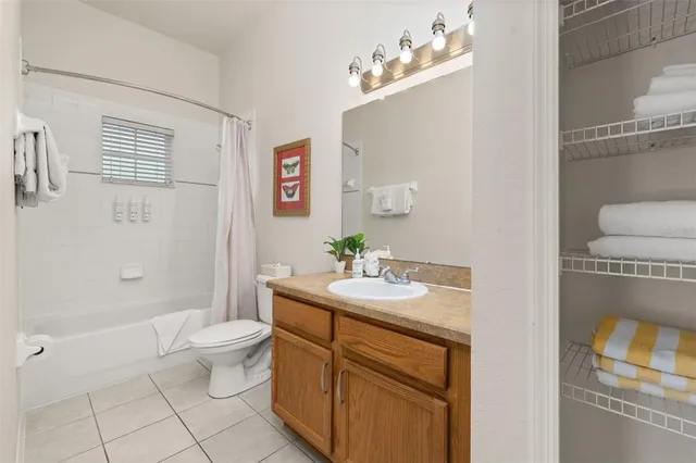 a view of a balcony with chairs