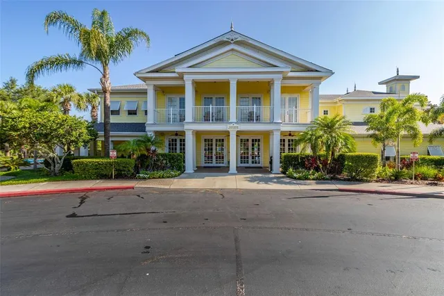 a view of balcony with wooden floor and lake view