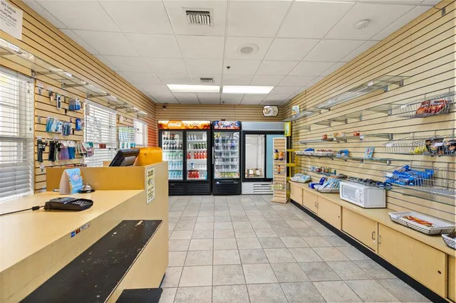 a view of swimming pool with an outdoor seating