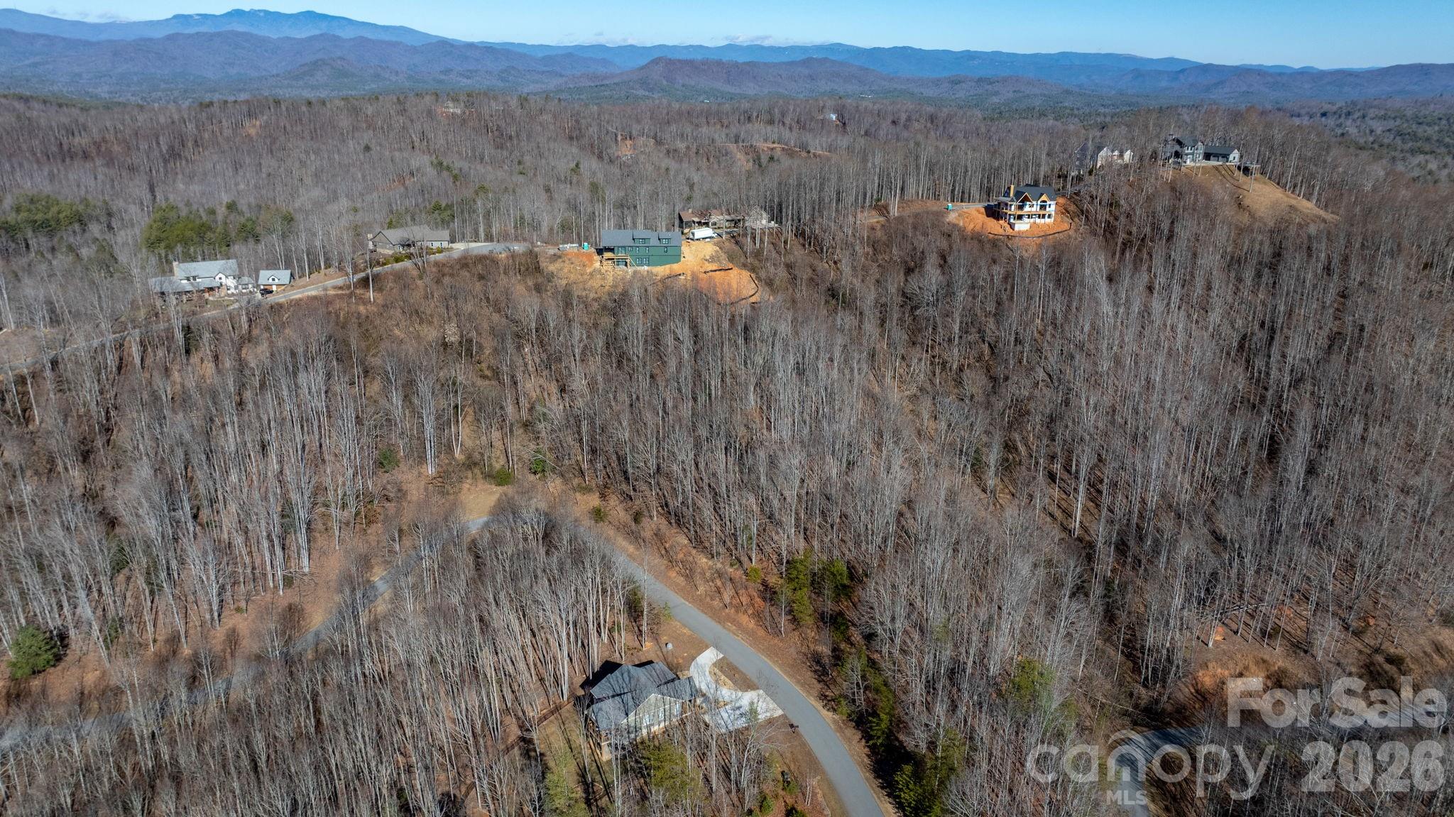 0 Round Rock Road Lenoir, NC 28645 - Photo 19 of 24 a view of a dry yard with wooden fence and a mountain view