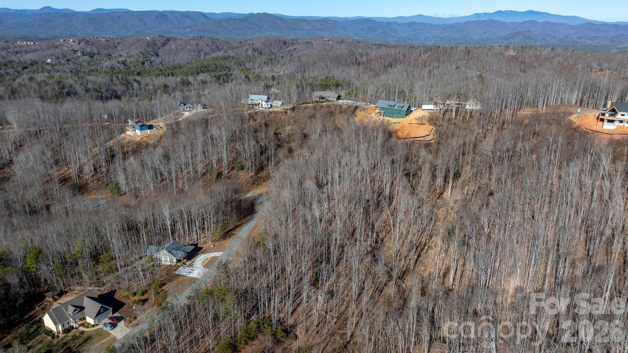 0 Round Rock Road Lenoir, NC 28645 - Photo 20 of 24 a view of a lake in middle of forest