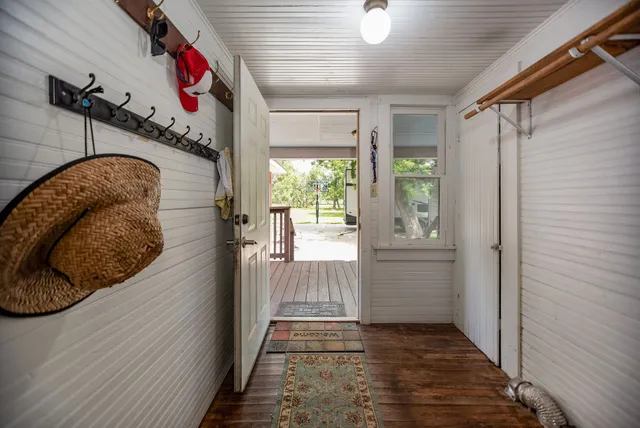a view of entryway with wooden floor