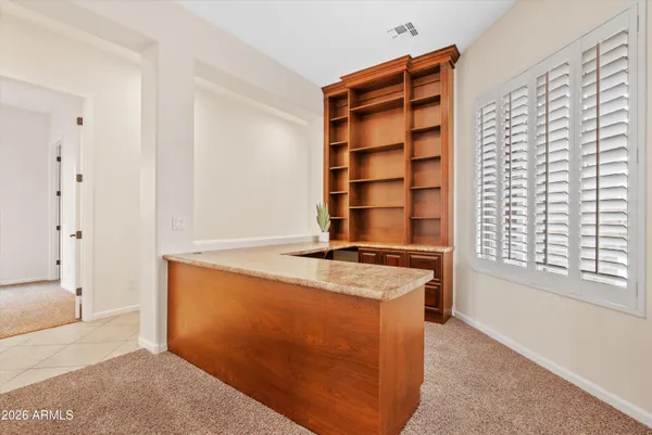 a view of a kitchen with a sink