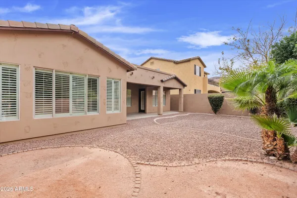 front view of a house with a street