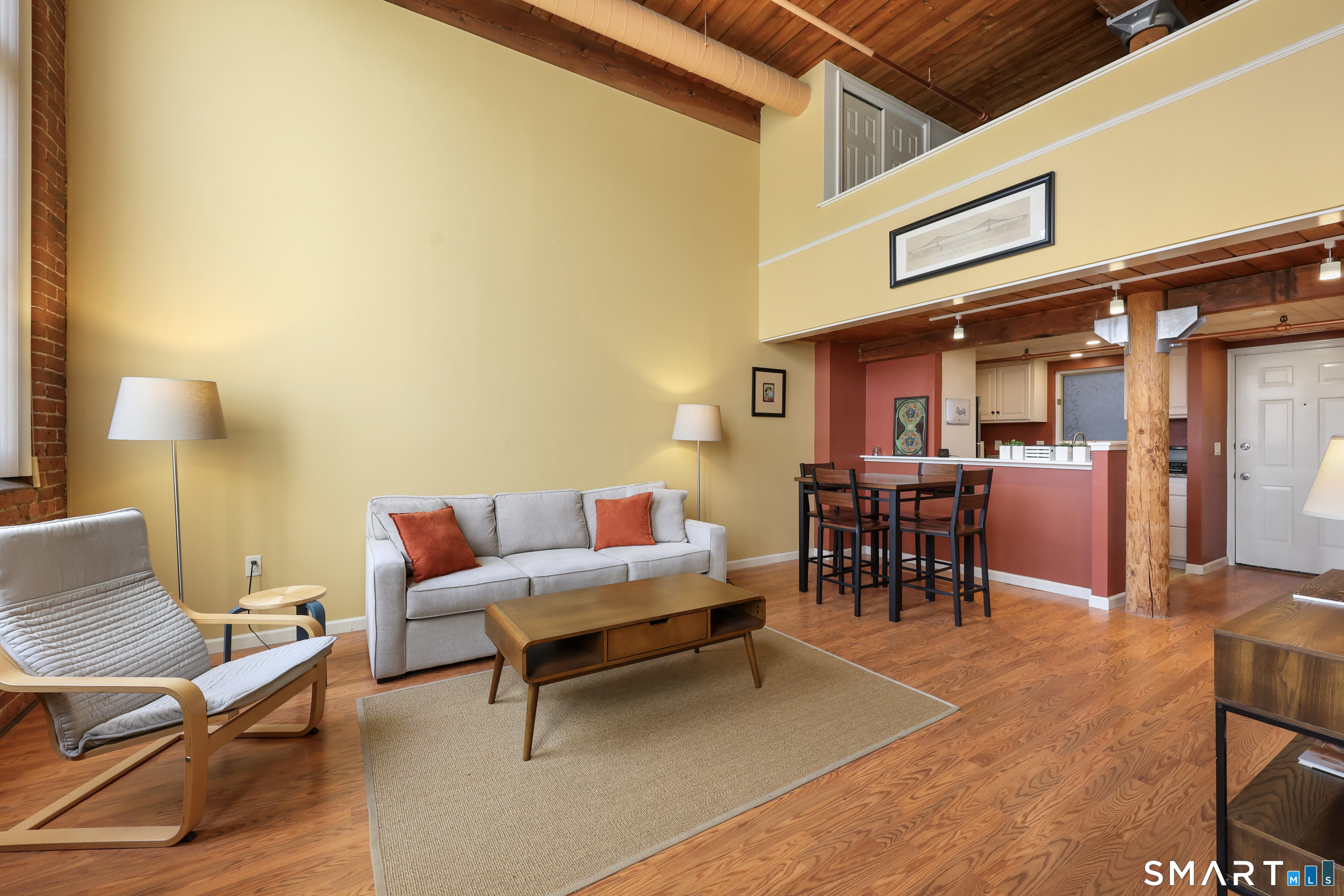 839 Main Street, Unit 40 Torrington, CT 06790 - Photo 18 of 31 a living room with furniture and a table