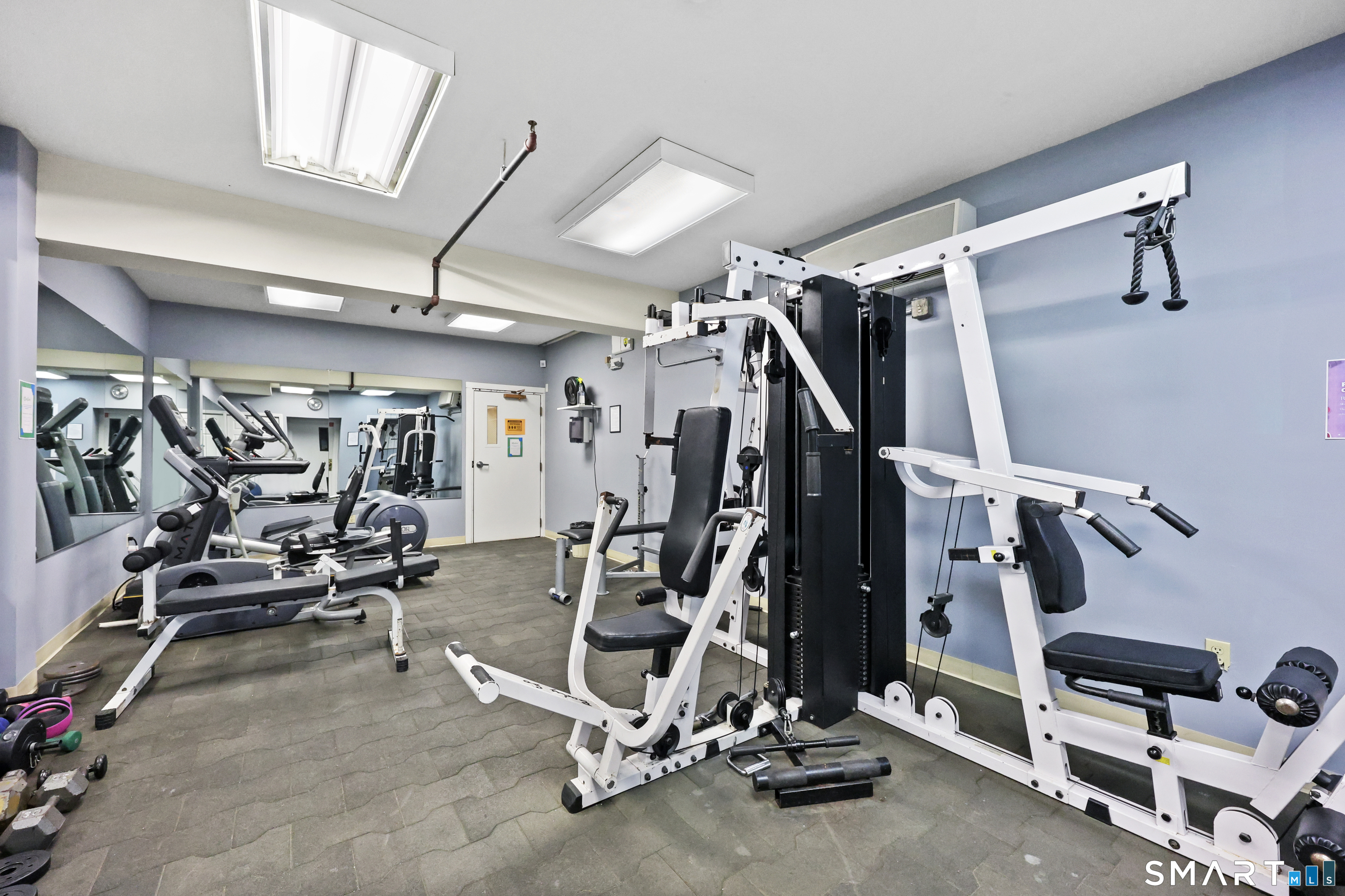 839 Main Street, Unit 40 Torrington, CT 06790 - Photo 30 of 31 a view of a room with gym equipment