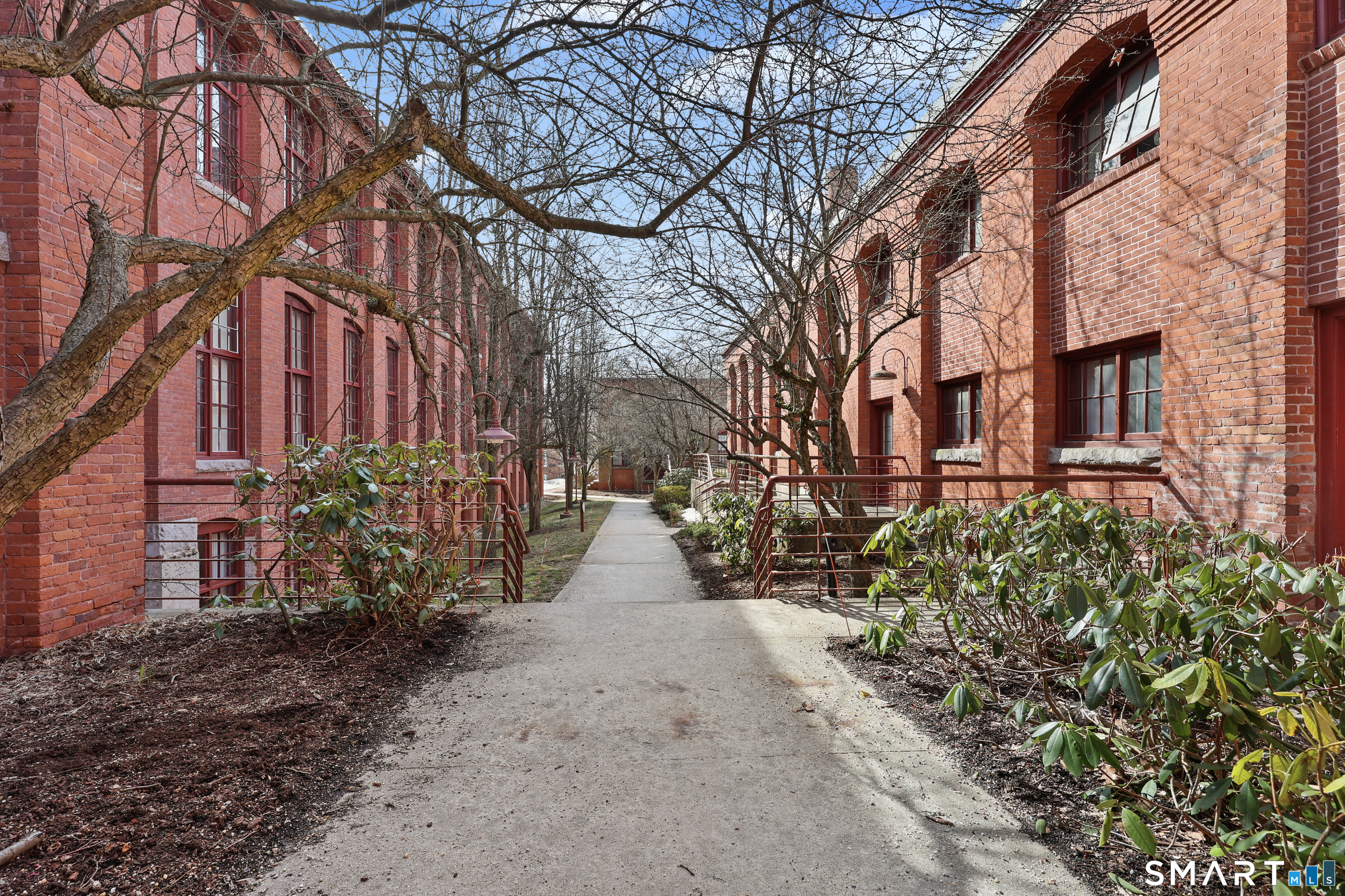 839 Main Street, Unit 40 Torrington, CT 06790 - Photo 31 of 31 a view of a pathway with a yard