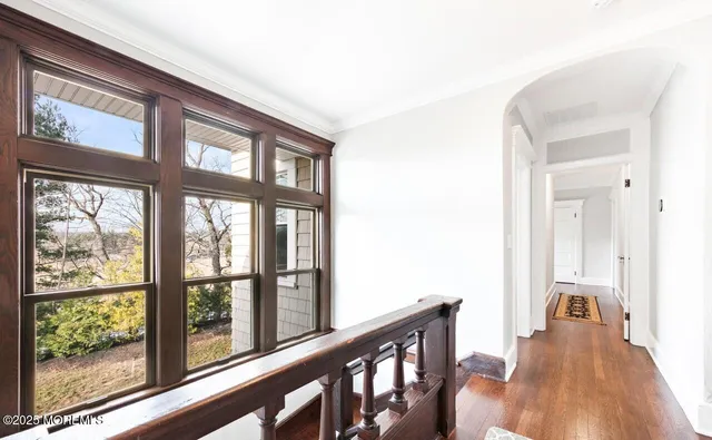 a view of a balcony with furniture