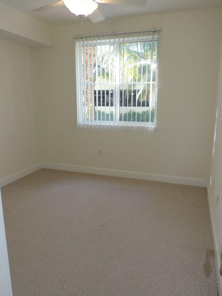 1 Renaissance Way, Unit 218 Boynton Beach, FL 33426 - Photo 13 of 22 Guest bedroom