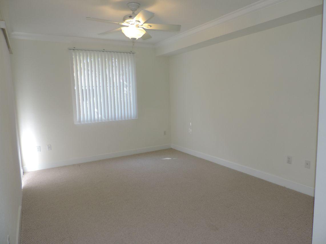 1 Renaissance Way, Unit 218 Boynton Beach, FL 33426 - Photo 4 of 22 Master bedroom
