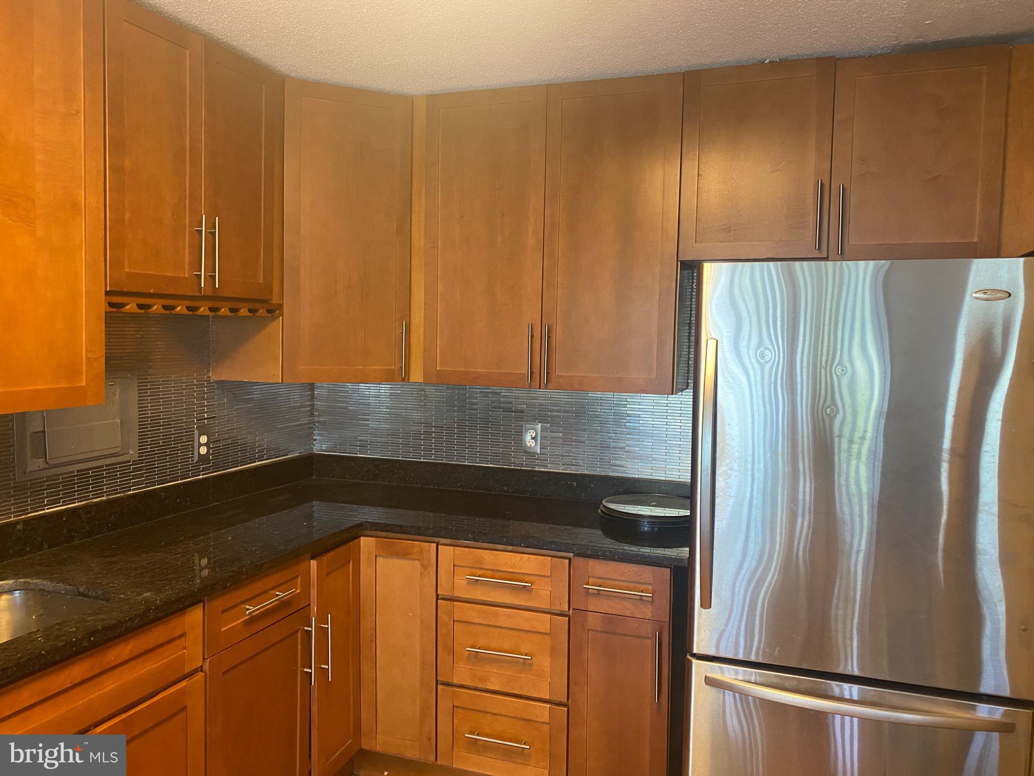 1836 Metzerott Road, Unit 707 Hyattsville, MD 20783 - Photo 6 of 13 Modern kitchen with sleek finishes.