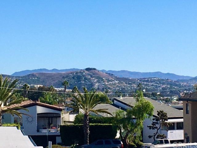 24331 Pasto Road, Unit A Dana Point, CA 92629 - Photo 1 of 1 View of the hillside from the living area, patio and master bedroom.