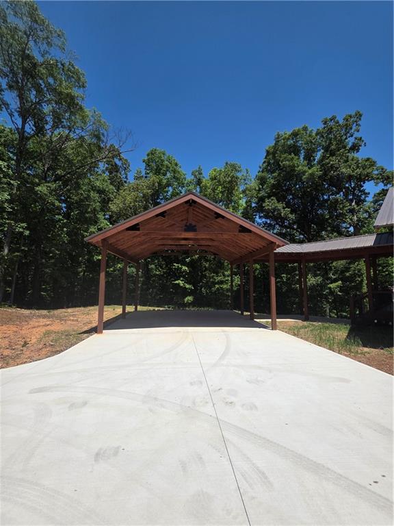 1217 Youngs Farm Road Cedartown, GA 30125 - Photo 6 of 29 a backyard of a house with yard and outdoor seating
